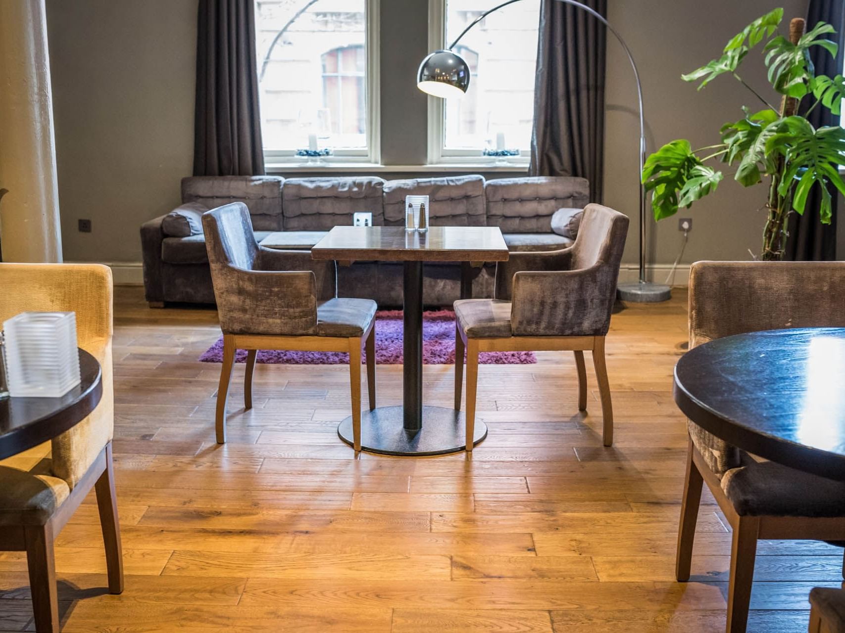 A bistro tables with chairs at Townhouse Hotel Manchester