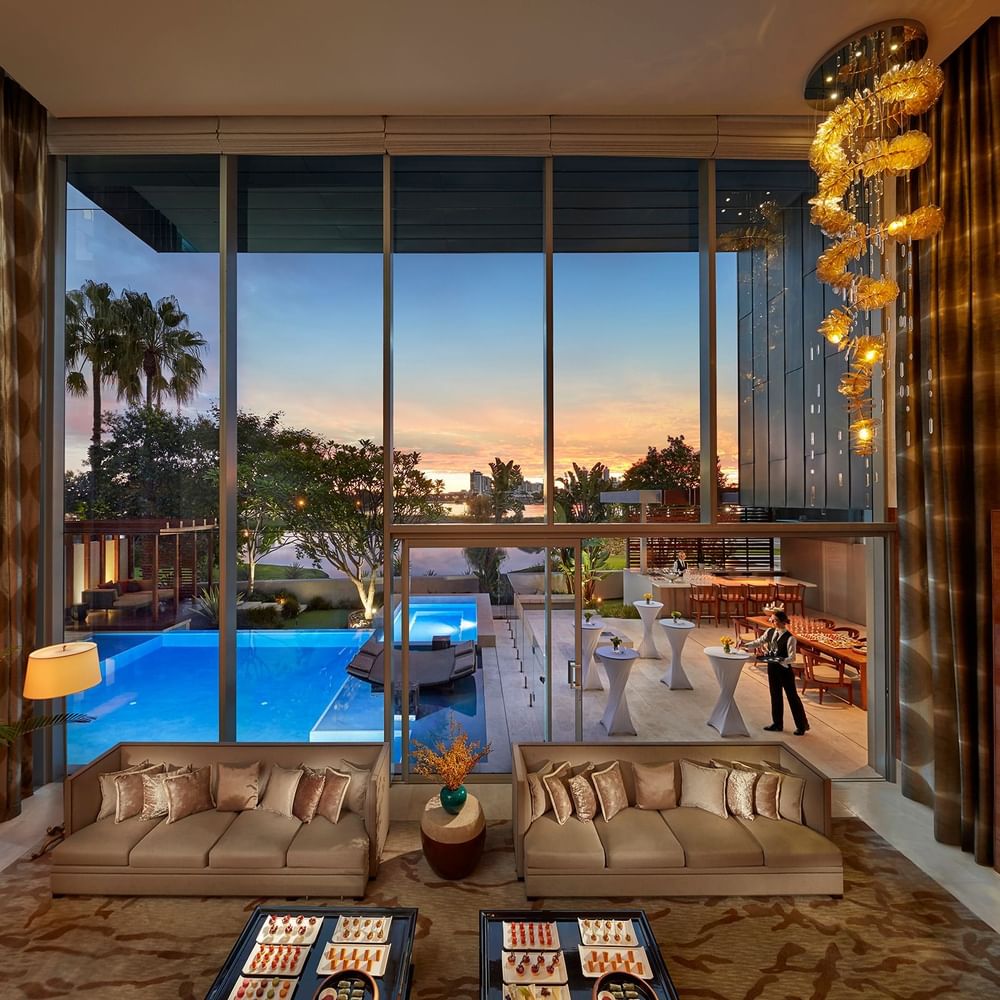 Mansions with floor-to-ceiling windows overlooking pool at Crown hotels Perth