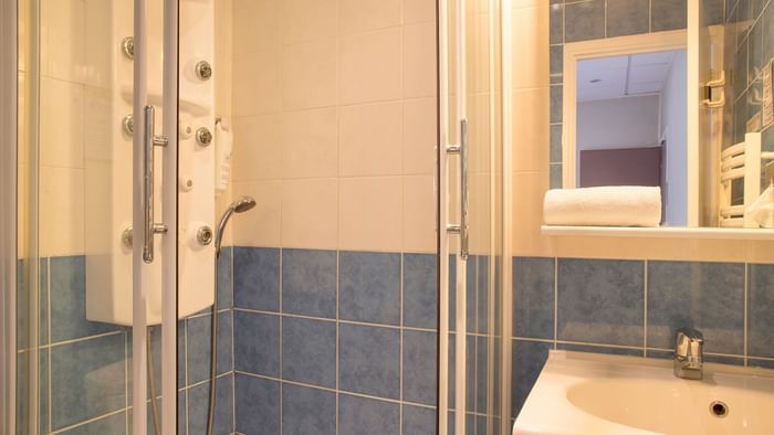 Bathroom vanity in bedrooms at Hotel du Pont Roupt