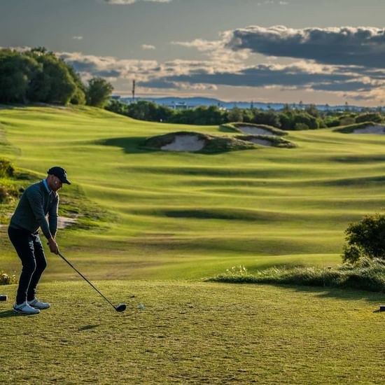 Golfer playing golf at magenta shores on the Central Coast NSW