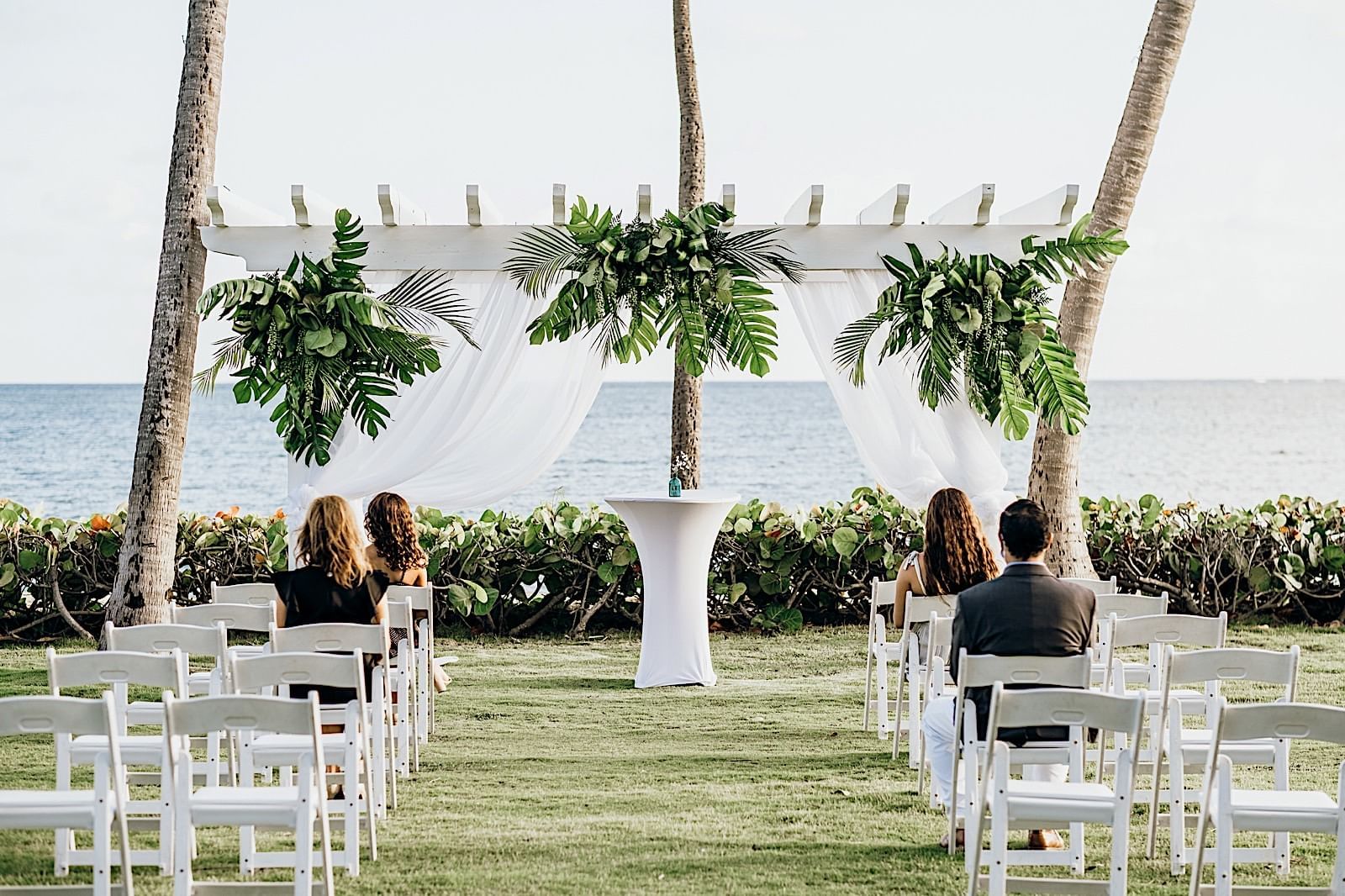 Outdoor wedding area with a beach view at Copamarina Weddings