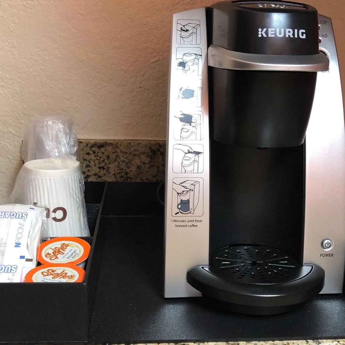 Coffee machine and coffee capsules at Flamingo Express Hotel