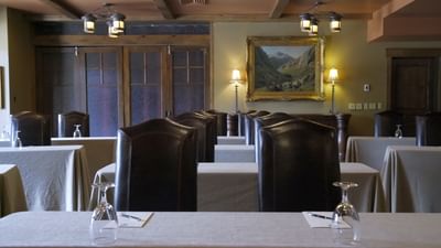 Classroom setup with scenic painting on the wall in crescent room at Hotel Park City Autograph Collection 