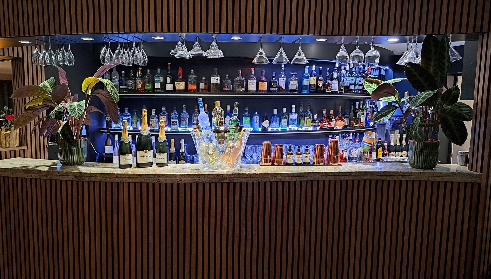 Sophisticated Bonobo’s Bar interior with an extensive selection of premium spirit bottles at Splendid Hotel & Spa Nice