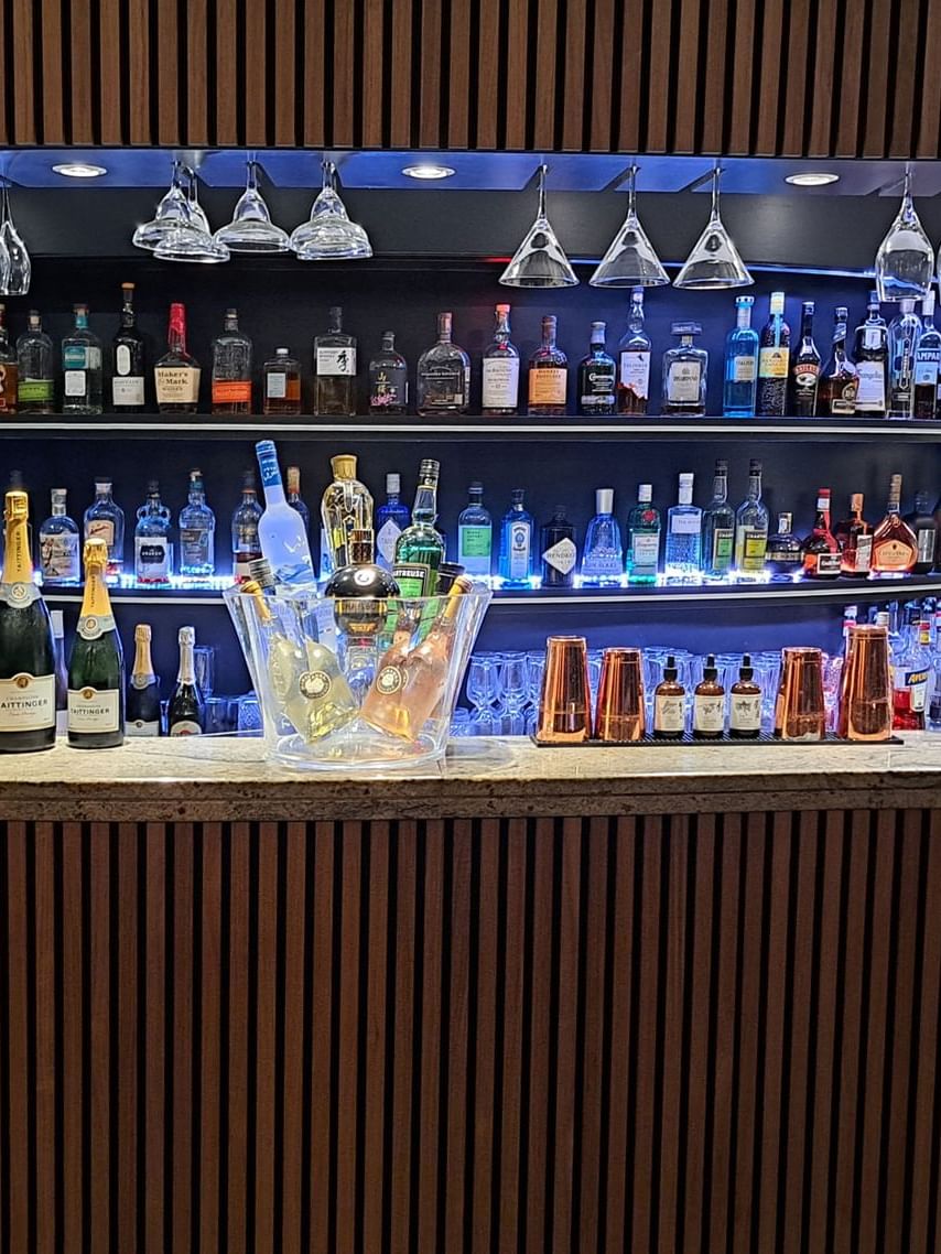 Sophisticated Bonobo’s Bar interior with an extensive selection of premium spirit bottles at Splendid Hotel & Spa Nice
