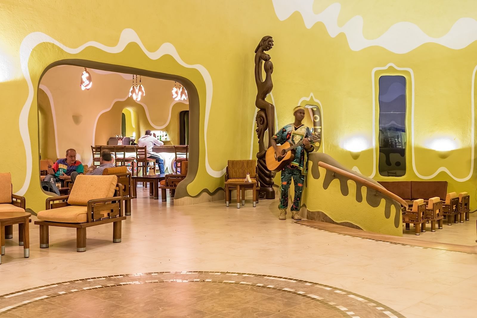Musician playing in Main restaurant at Mara Serena Safari Lodge