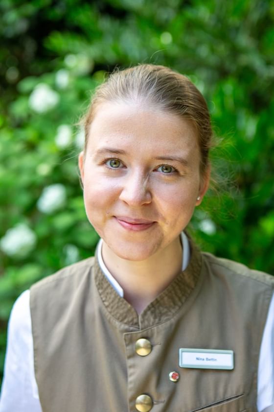Close-up of a portrait of a staff at Hotel Palace Munich