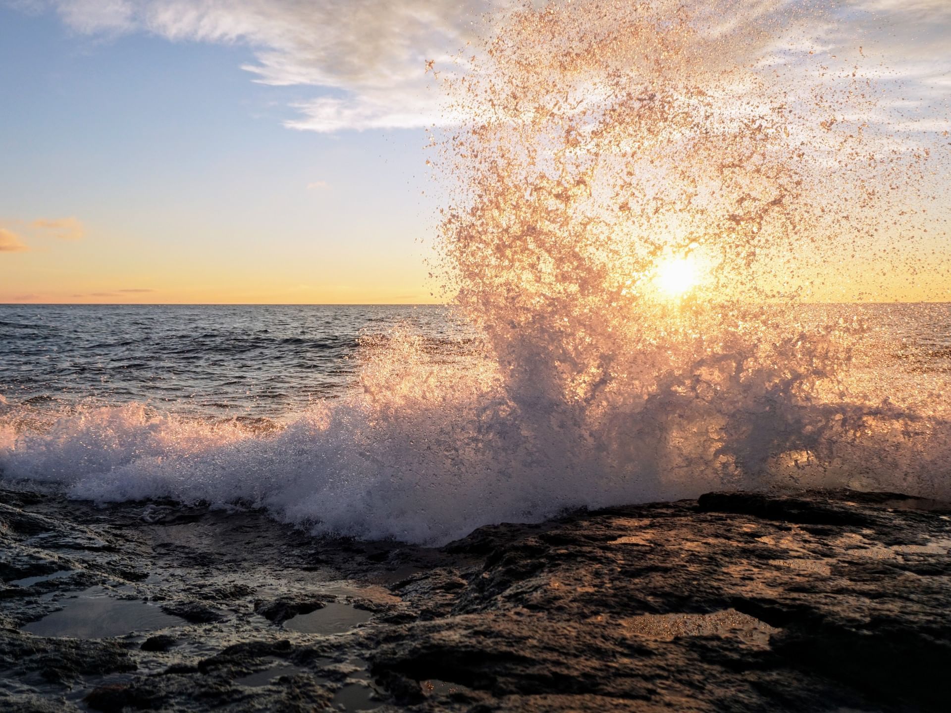 Summer waves in beach near Bluefin Bay Family of Resorts