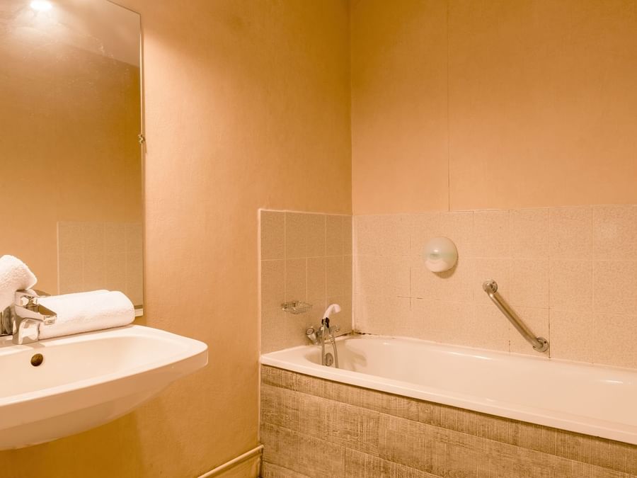 Bathroom vanity of bedrooms at Hotel Valence East
