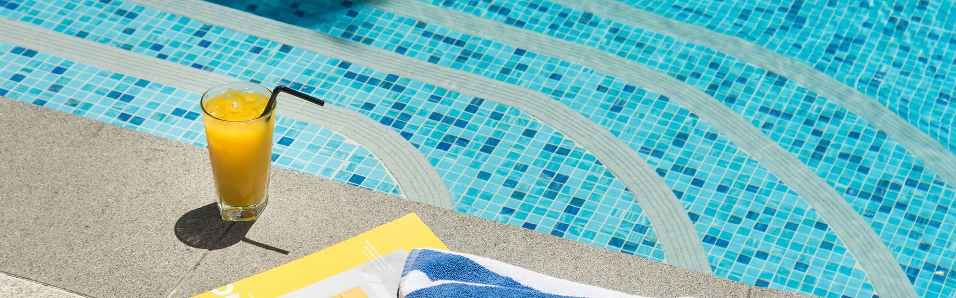 Fresh juice & towel near the pool at Crown Promenade Perth