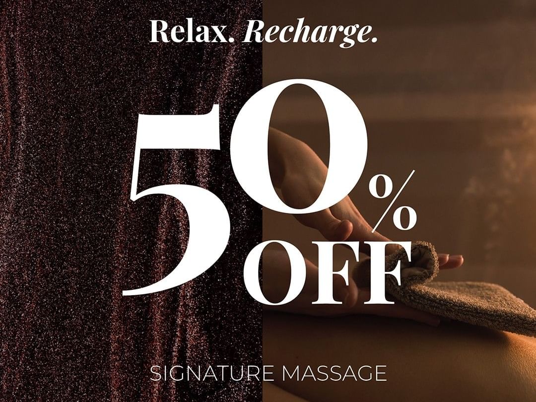 A promotional poster for a 50% off signature massage with a person holding a towel.