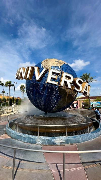 A large globe statue fountain that says UNIVERSAL around it, located at Universal Studios. Enjoy music and worship at Universal Studios’ Rock the Universe 2025. 