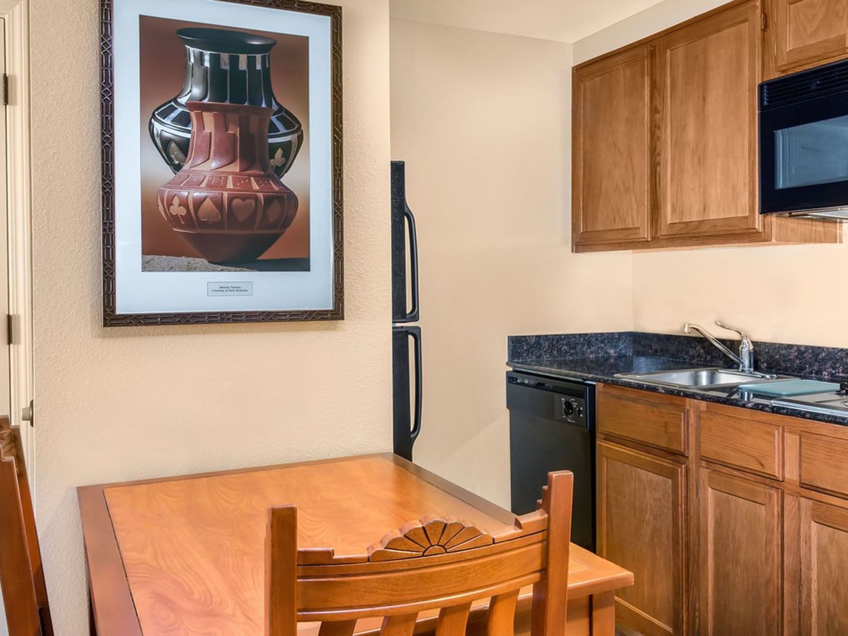 Kitchenette of the One King Two Queen Two Bedroom Suite at the Hilton Santa Fe Buffalo Thunder hotel.