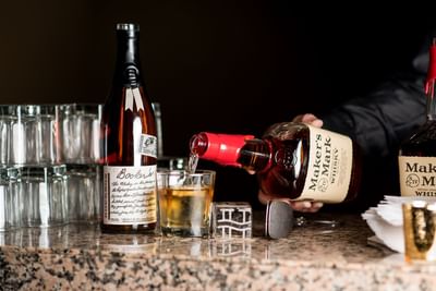 bartender pouring makers mark
