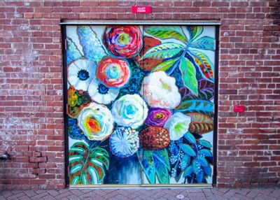 A colorful Artwork mural on a door at Hotel at Old Town Wichita