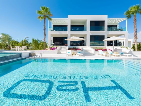 Pool with hotel name on the bottom at H2O Life Style Resort