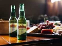 Beer bottles & food platter served in James Boags's Brewery near Hotel Grand Chancellor Launceston