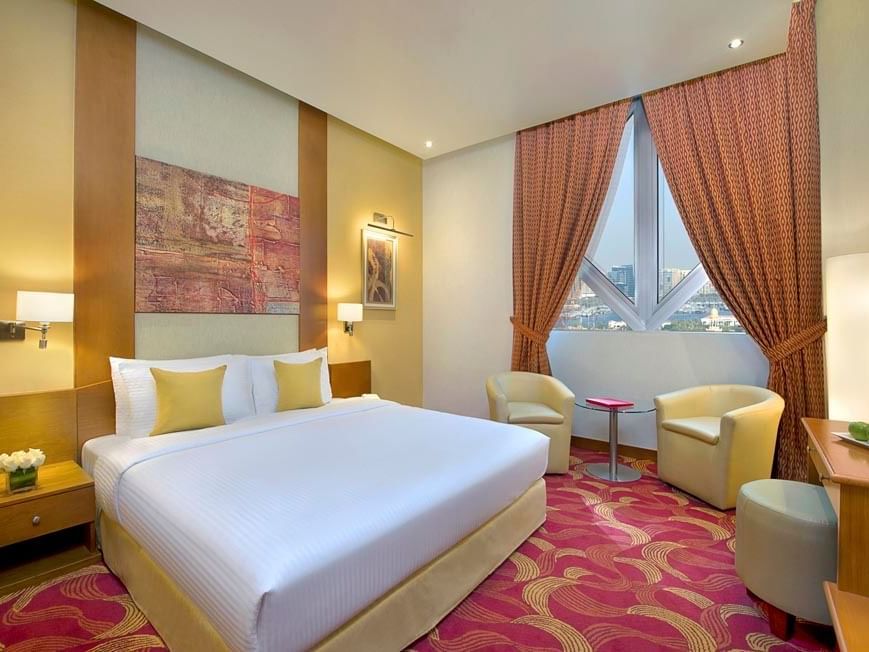 King Bed & furniture in Premium Room at City Seasons Hotels