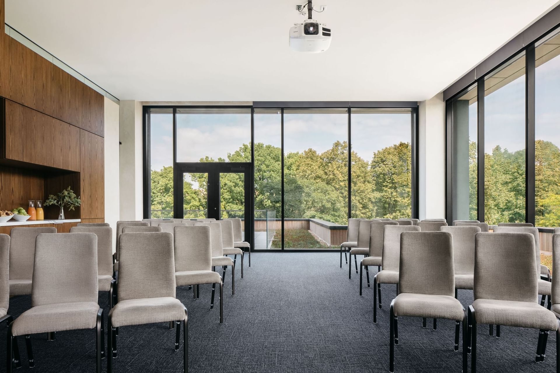 Conference room with rows of chairs in The Study at the University of Chicago