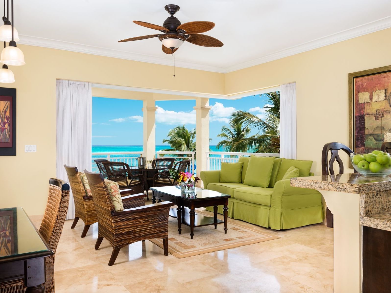 The living room of 2 Bedroom Deluxe Oceanfront at Windsong Resort On The Reef