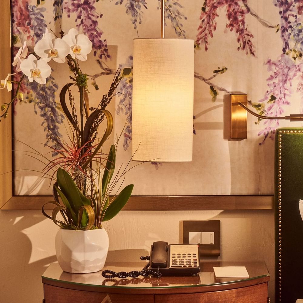 A couple having breakfast on bed at Brazilian Court