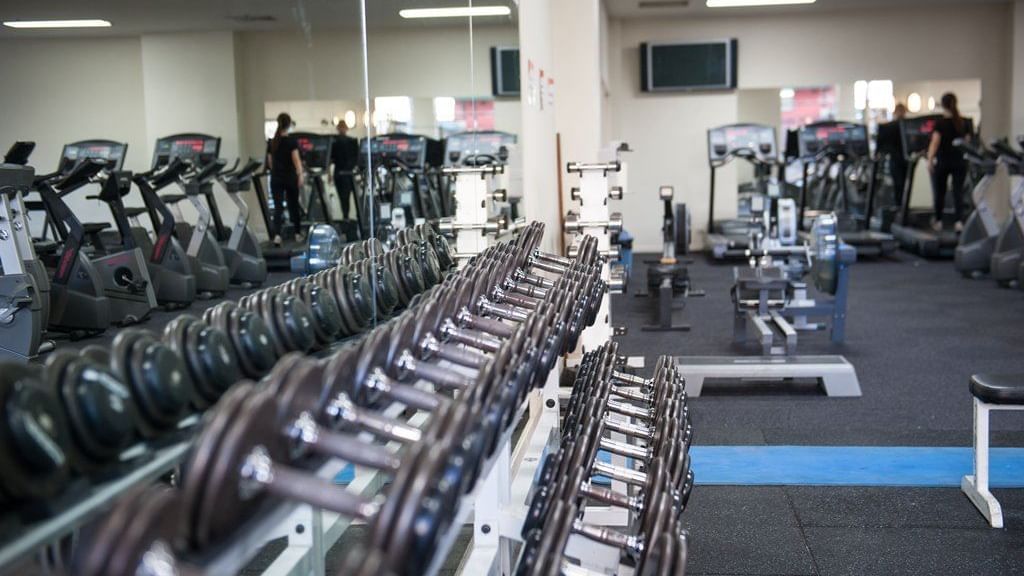 College Square on Lygon_Fully equipped gymnasium with two-tier weights rack