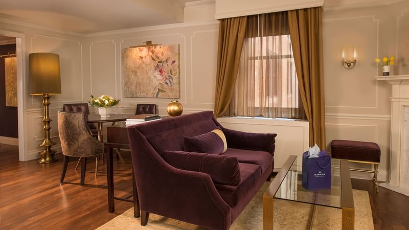 Living area and dining table in Follie Suite at Warwick New York