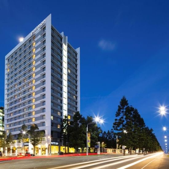 Exterior view of Pullman Sydney Olympic Park & street