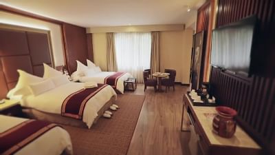 Sumaq Deluxe family room with three beds at Hotel Sumaq