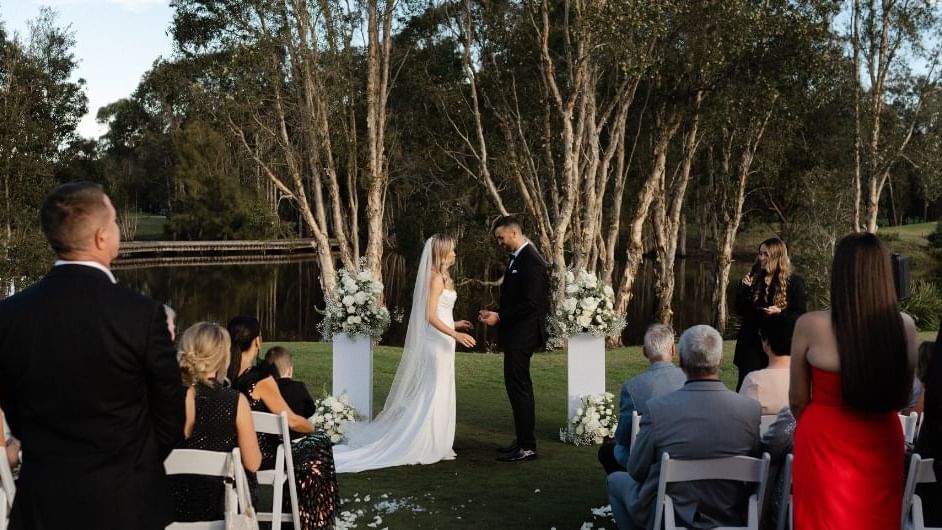 Outdoor wedding ceremony with a couple at the altar near Mercure Kooindah Waters