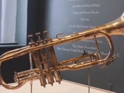 A trumpet in the Jazz Museum showcase near Andrew Jackson Hotel