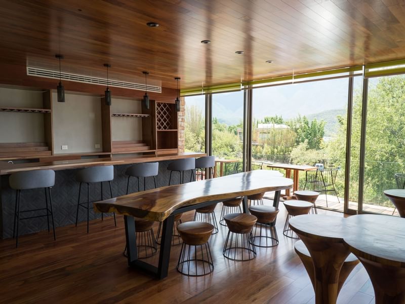 Los Agapantos Bar with bar stools at Gamma Hotels