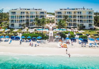 Aerial view of Windsong Resort On The Reef with beachline