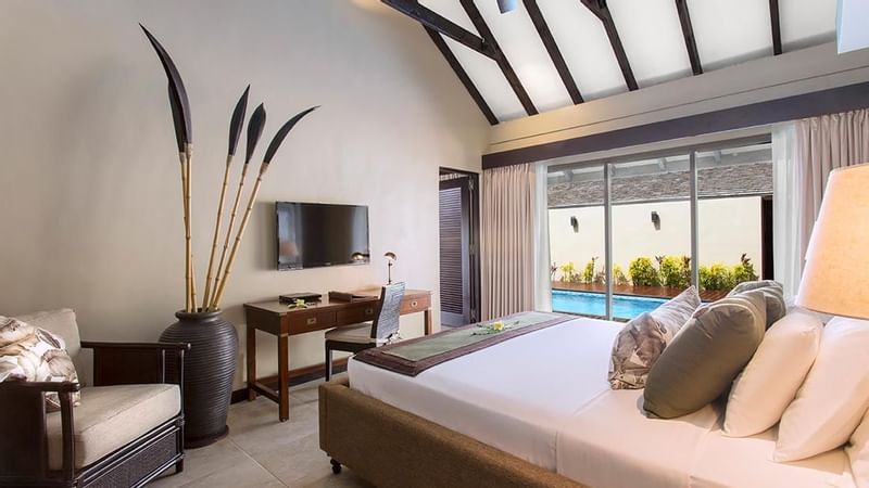 TV & bed in Pacific Pool Villa at Warwick Le Lagon