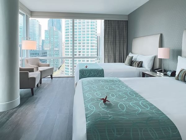 Two beds in a hotel corner room