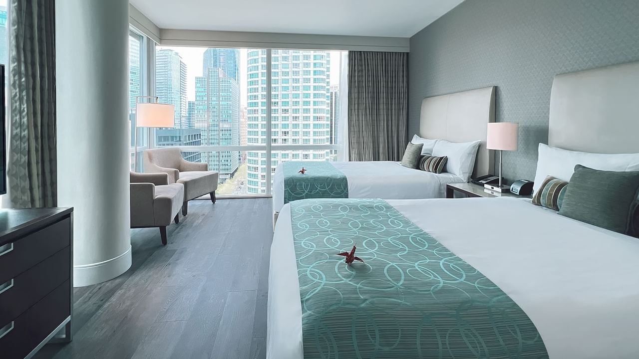 Two beds in a hotel corner room