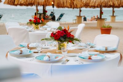 Close-up of beachside dining table arrangement at Passions on the Beach