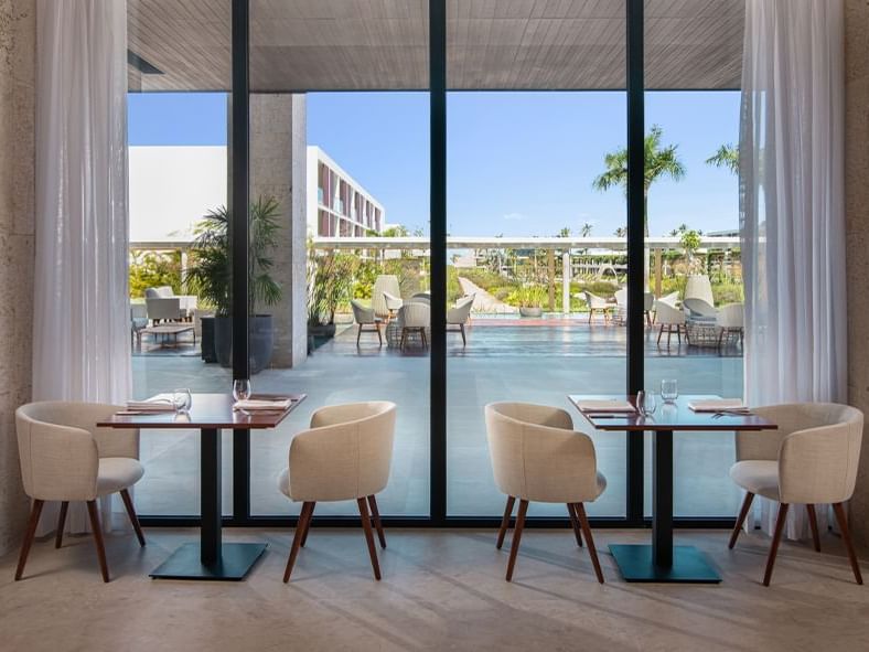 Liberi restaurant dining area with outdoor view, La Colección