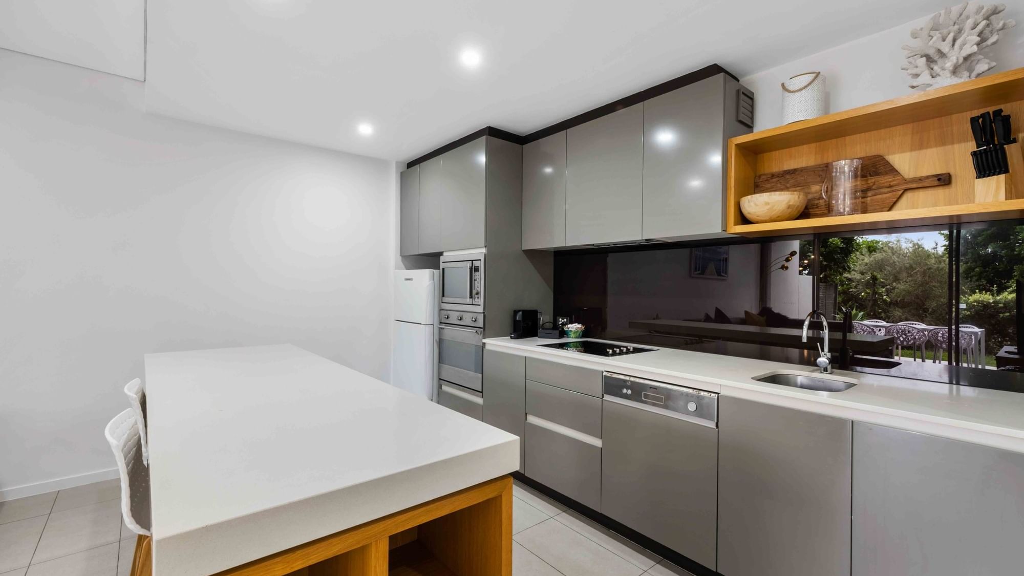 Deluxe Three Bedroom Kitchen Pullman Magenta Shores Resort