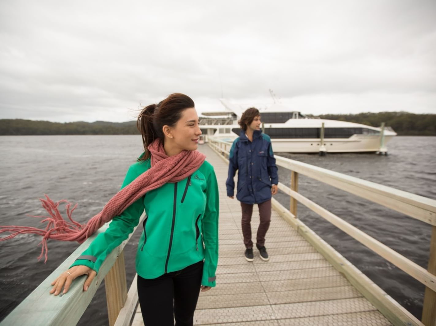 A couple on the jetty in Sarah Island near Gordon River Cruise