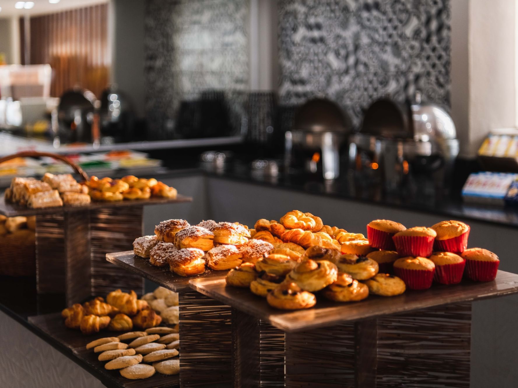 Baked goods displayed on the counter at La Colección Resorts