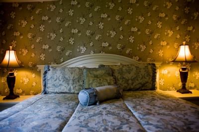 guest room with bed and two nightstands