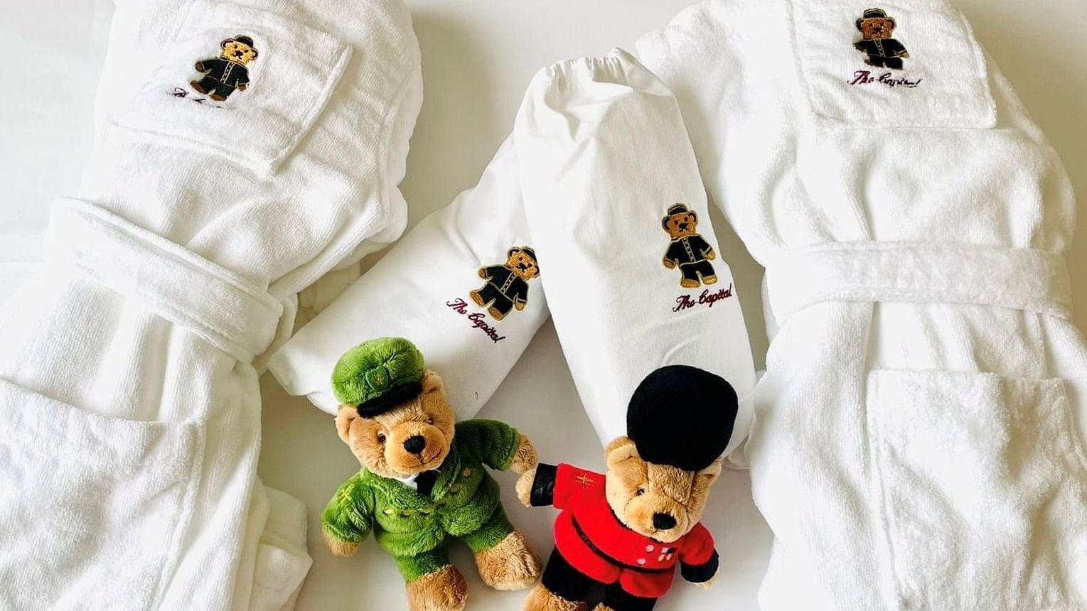 Teddy bear robes & soft toys on the bed, Featuring Family offer at The Capital Townhouse