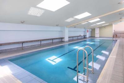 Indoor swimming pool area at Nesuto Canberra Apartment Hotel