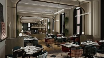 Modern Gott's Bar & Kitchen at The Met Hotel Leeds, England, with decorative archways and vibrant seating