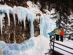 A couple in Johnston Canyon near Blackstone Mountain Lodge