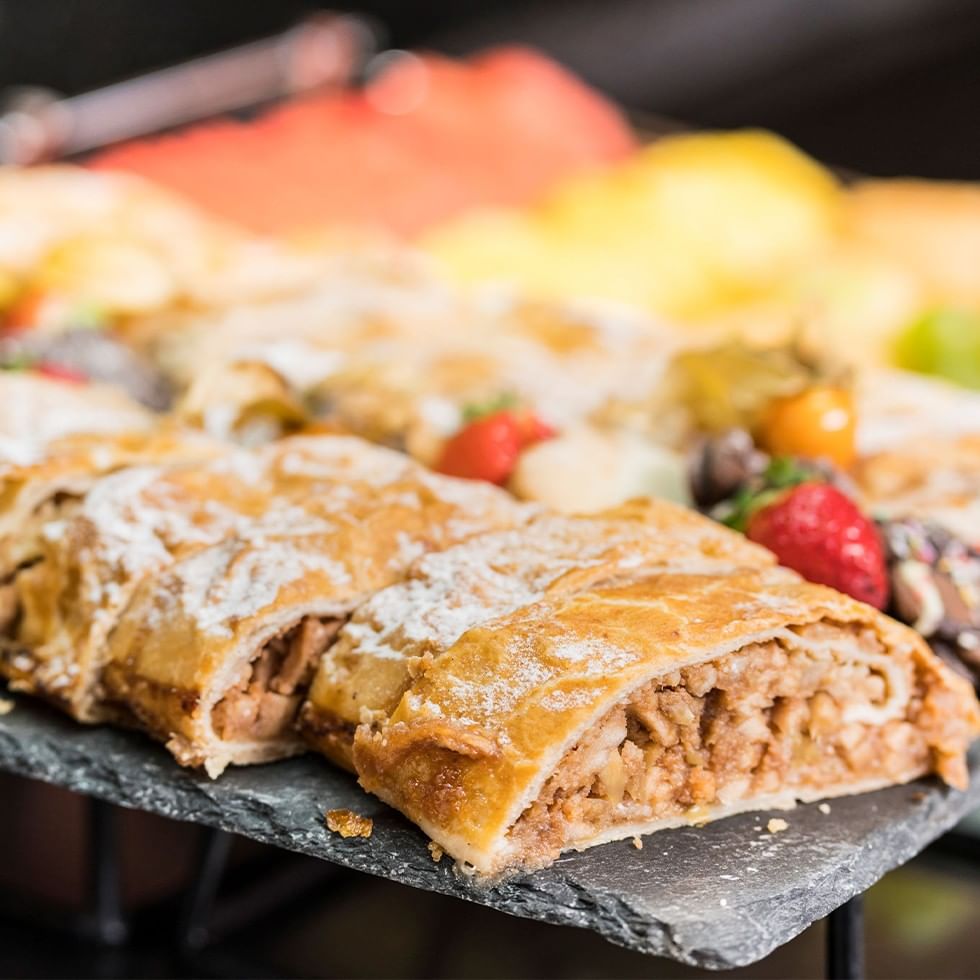 Strudel slices with strawberries and other fruits for the Taste Stories event.