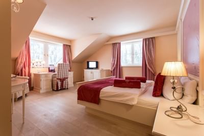 Bedroom interior of Comfort Superior Suite at Liebes Rot Flueh