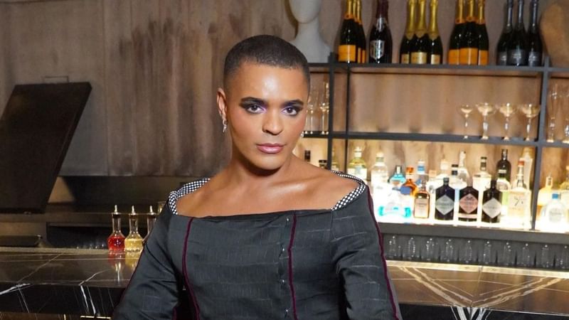 Layton Williams sitting at The Stage at The Londoner Hotel for this months Maybe It's Because I'm a Londoner interview