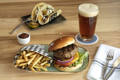 Burger, fries, tacos and a beverage